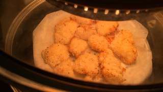 放入光波爐中烤香一面